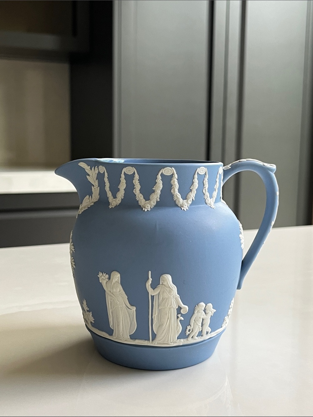 Wedgwood Jasperware Blue and White Pitcher with Neoclassical Relief.